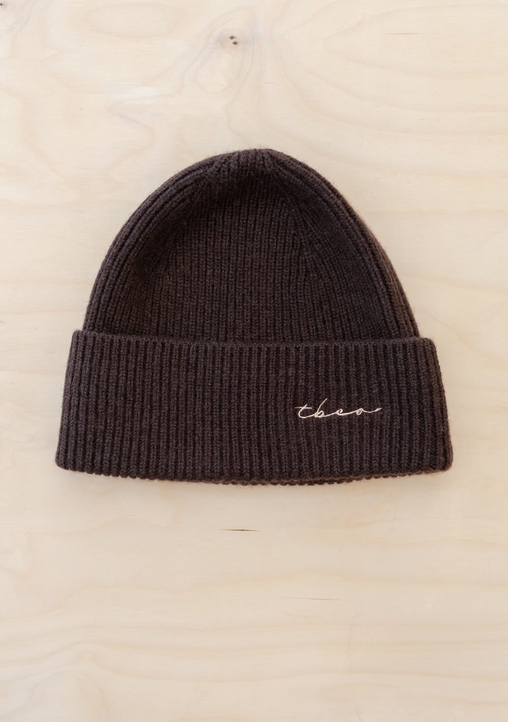Cashmere & Merino Beanie in Chocolate by TBCo with ribbed knit texture and subtle TBCo logo embroidery.