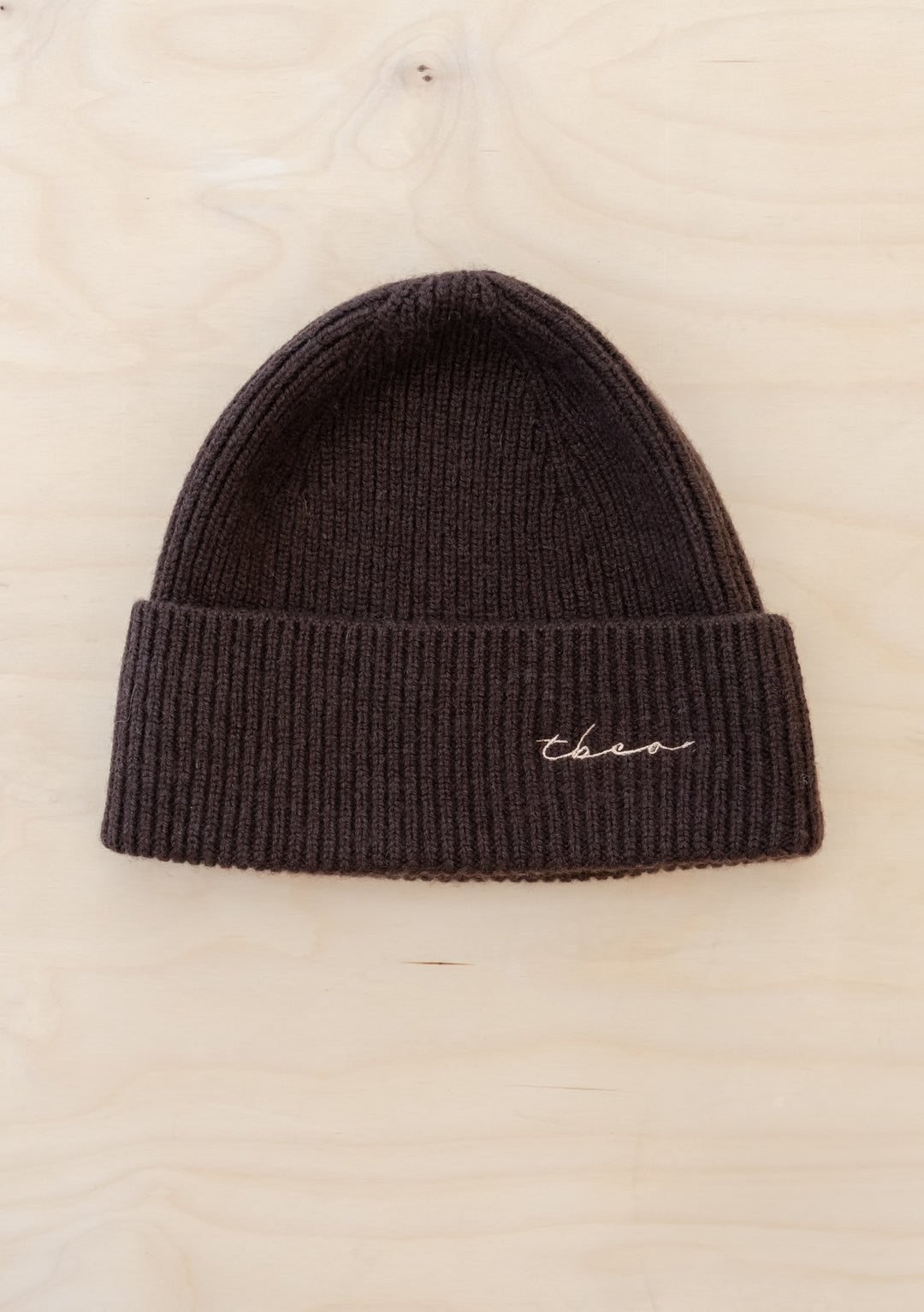 Cashmere & Merino Beanie in Chocolate by TBCo with ribbed knit texture and subtle TBCo logo embroidery.