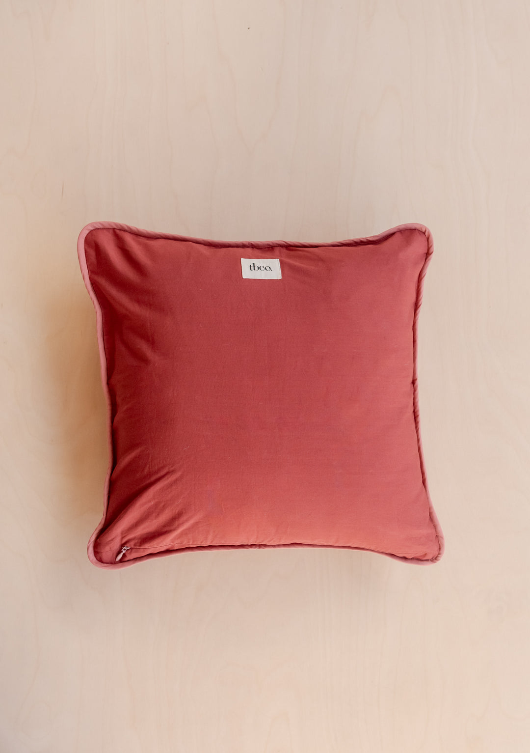 TBCo Flora Quilted Cushion Cover in coral pink cotton, featuring textured floral pattern and piped edges, 40x40cm square