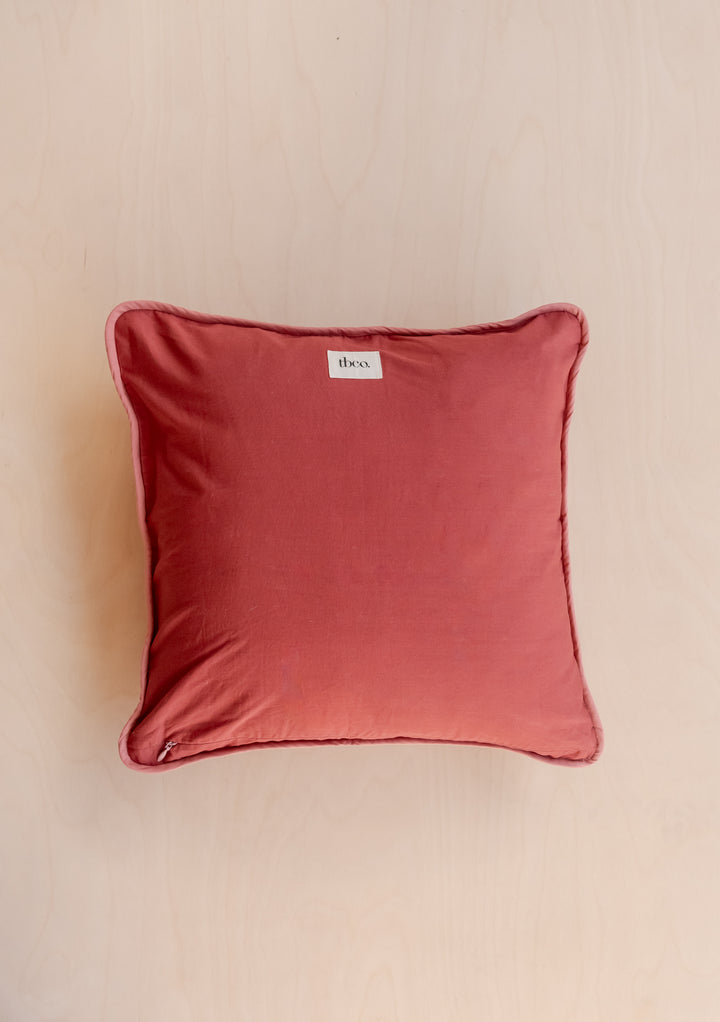 TBCo Flora Quilted Cushion Cover in coral pink cotton, featuring textured floral pattern and piped edges, 40x40cm square