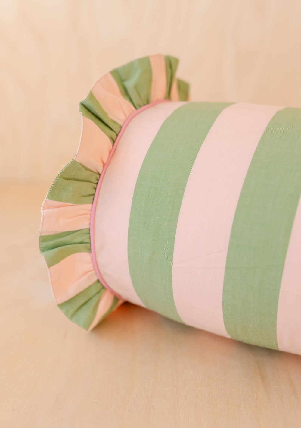 Cotton Bolster Cushion Cover in Green Stripe Ruffle by TBCo with textured frill trim and soft cotton blend fabric.