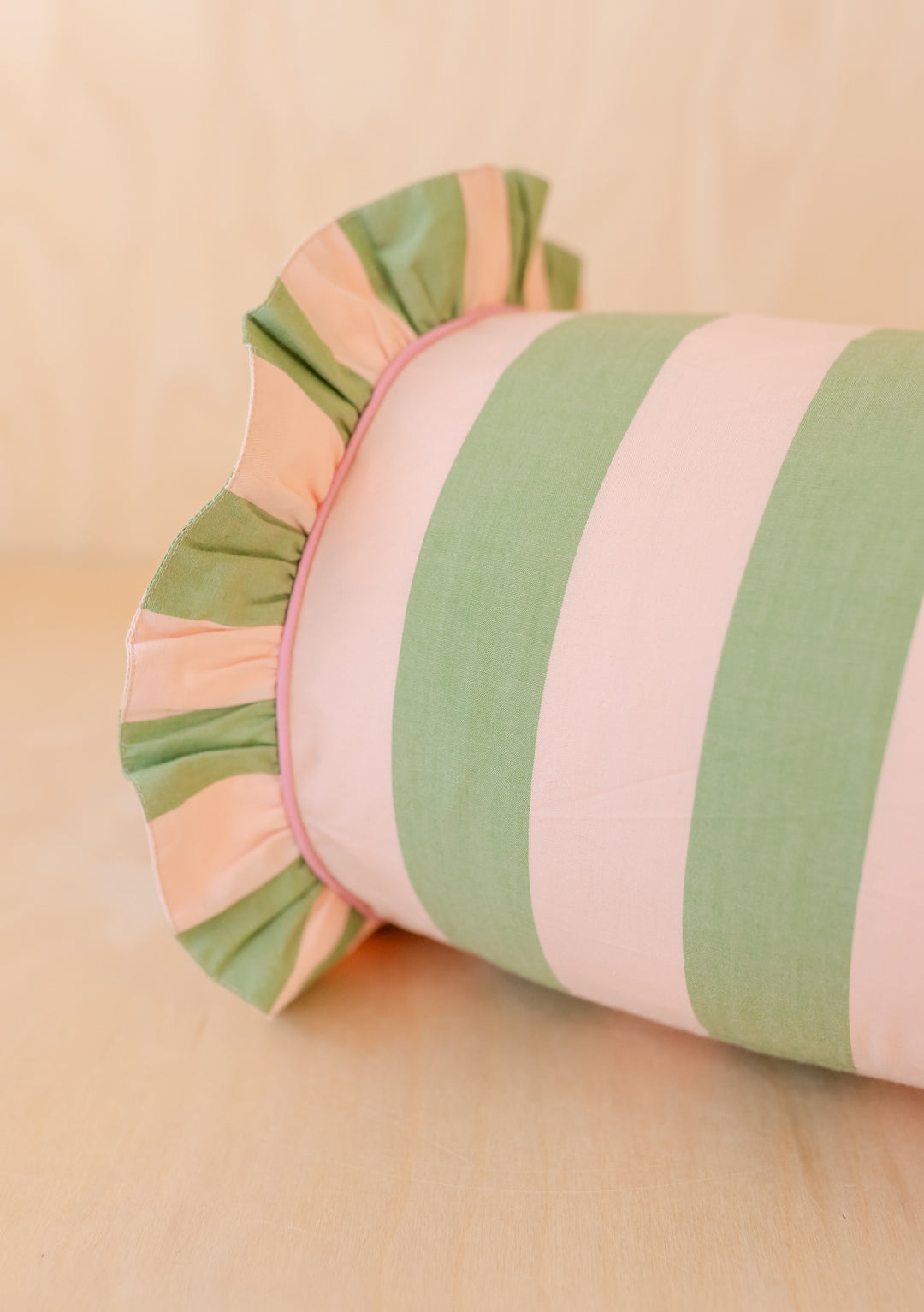 Cotton Bolster Cushion Cover in Green Stripe Ruffle by TBCo with textured frill trim and soft cotton blend fabric.