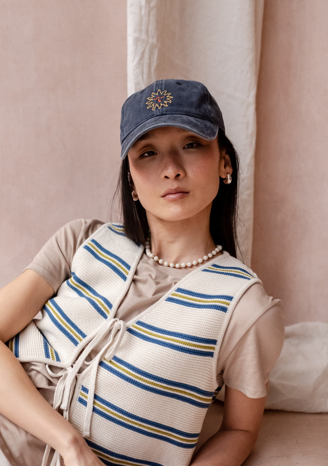 TBCo Recycled Cotton Cap in Sun with embroidered floral detail, adjustable blue cotton baseball cap with breathable design