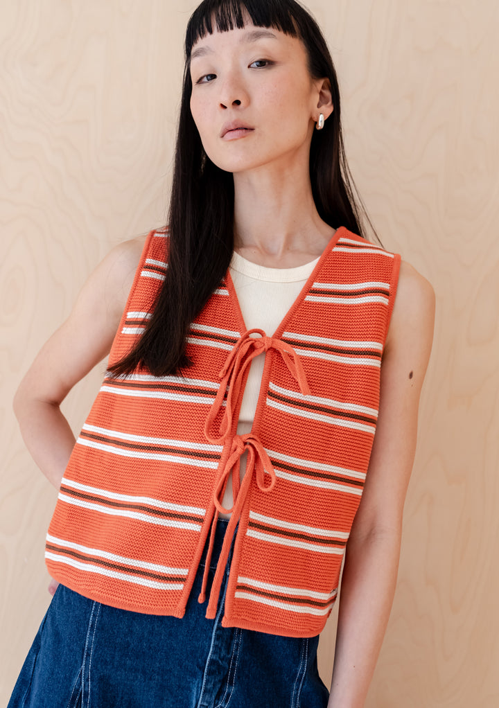 TBCo Cotton Knitted Vest in tangerine and cream stripe pattern with front tie closure, showcasing garter stitch detailing