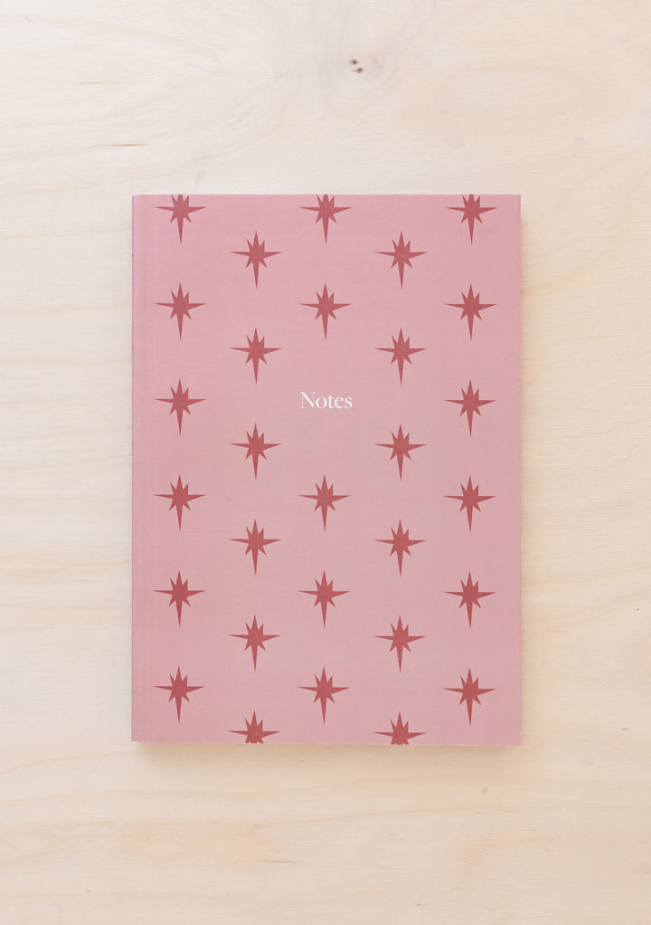 TBCo Pink Celestial Notebook featuring repeating star pattern on textured pink cover with Notes typography