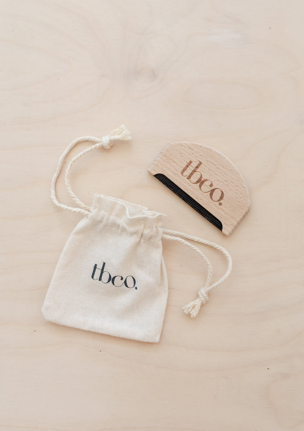 TBCo Wooden Wool Comb with natural beechwood construction and cotton storage pouch for wool care and depilling