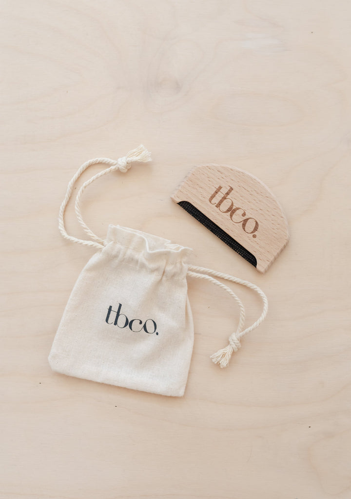 TBCo Wooden Wool Comb with natural beechwood construction and cotton storage pouch for wool care and depilling