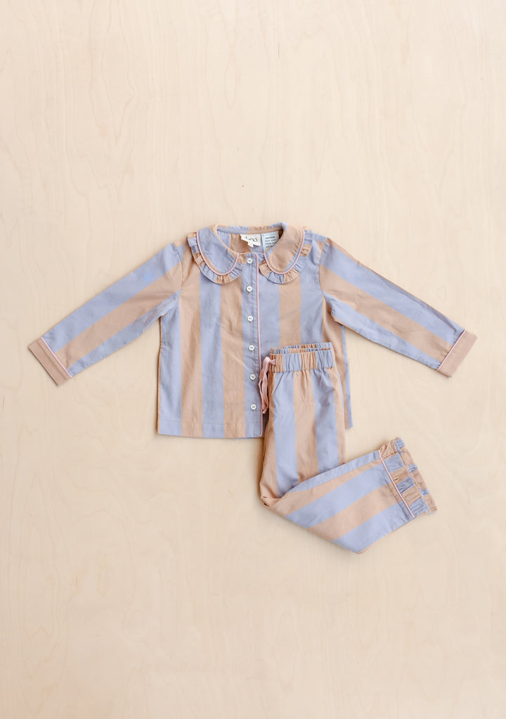 TBCo Cotton Kids Pyjamas in orange and lilac stripe with ruffled collar, laid flat showing top and bottom set