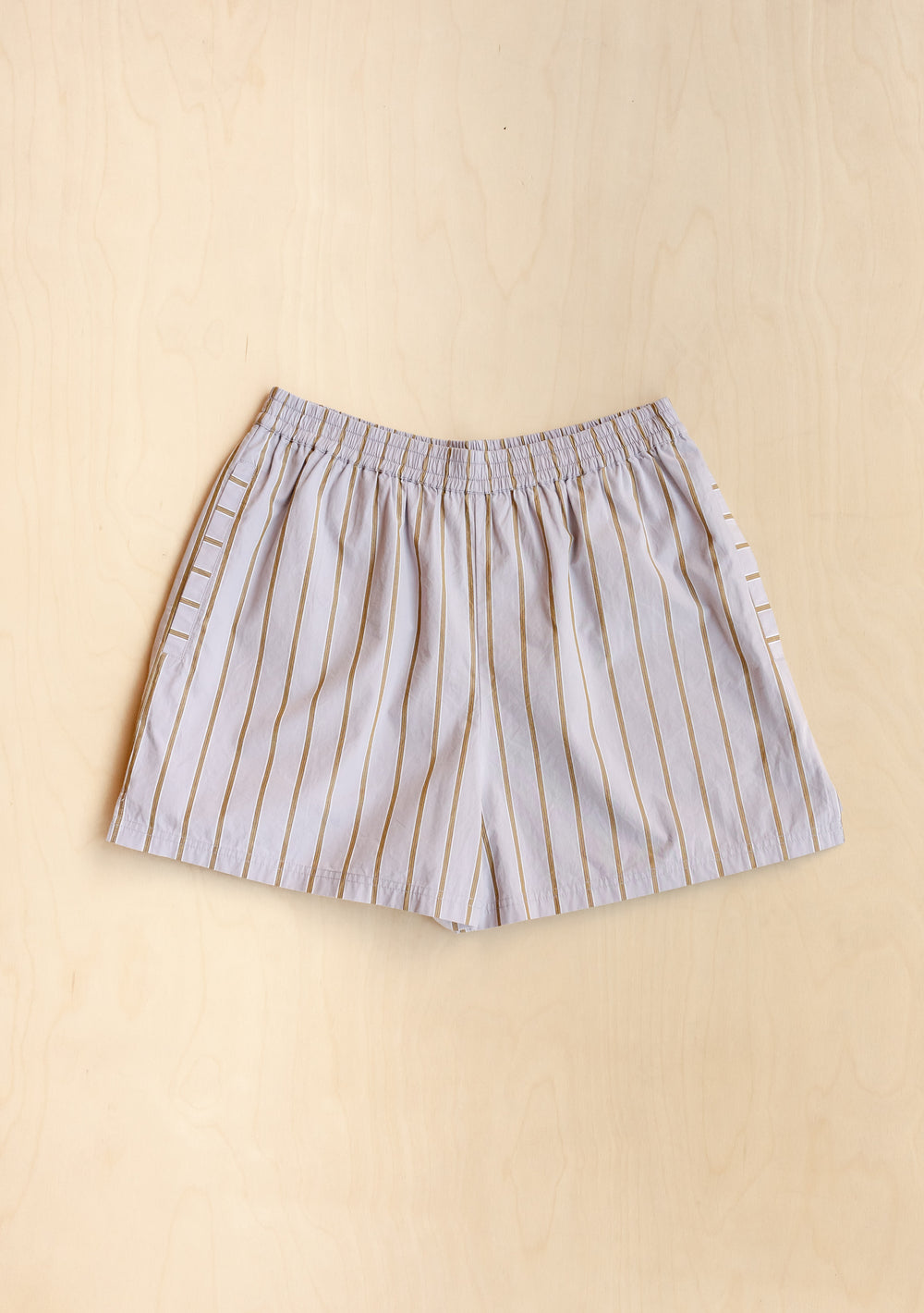 TBCo Cotton Shorts in lilac with olive stripes, elasticated waist, relaxed fit loungewear on beige background