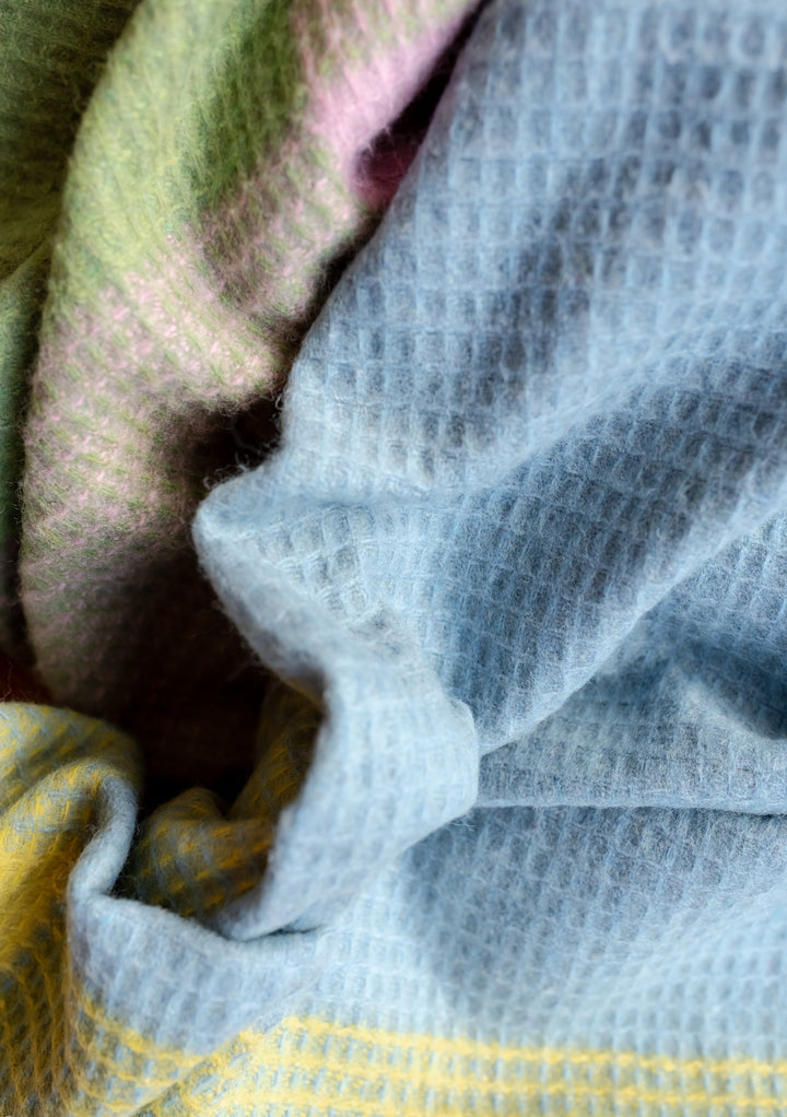 TBCo Recycled Wool Blanket in Green Waffle Block featuring textured weave pattern in pastel green, blue, pink and yellow checks
