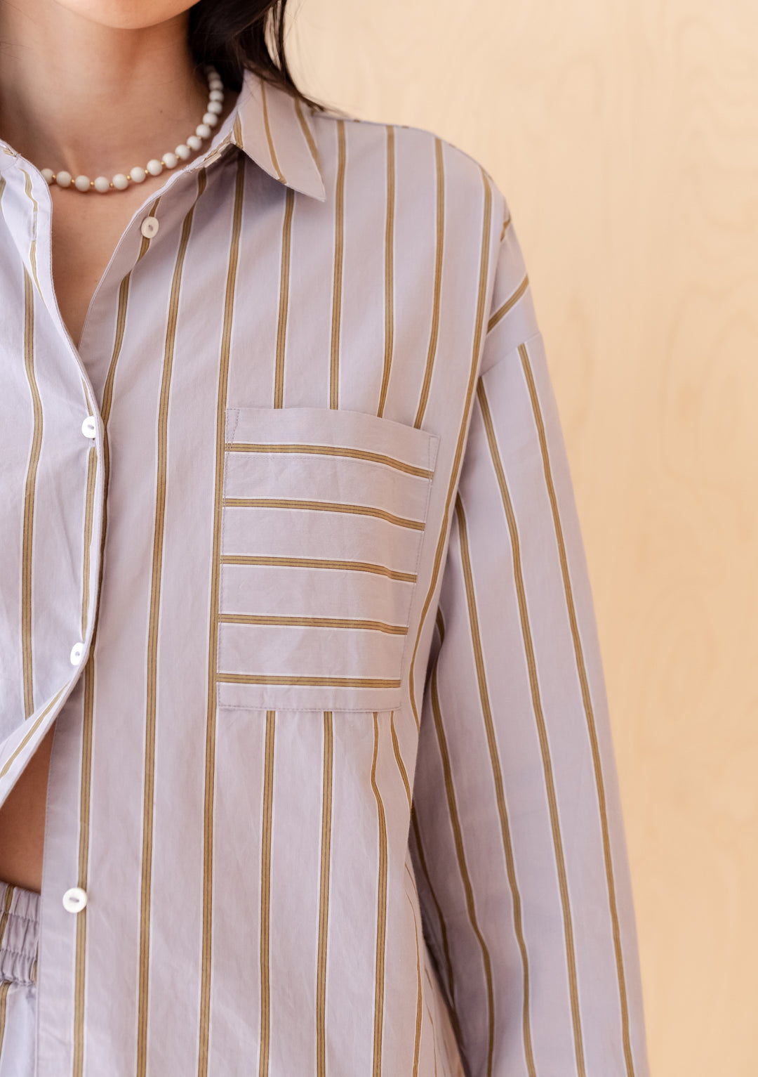 TBCo Cotton Shirt in Lilac Stripe with olive vertical stripes, oversized fit featuring front pocket detail