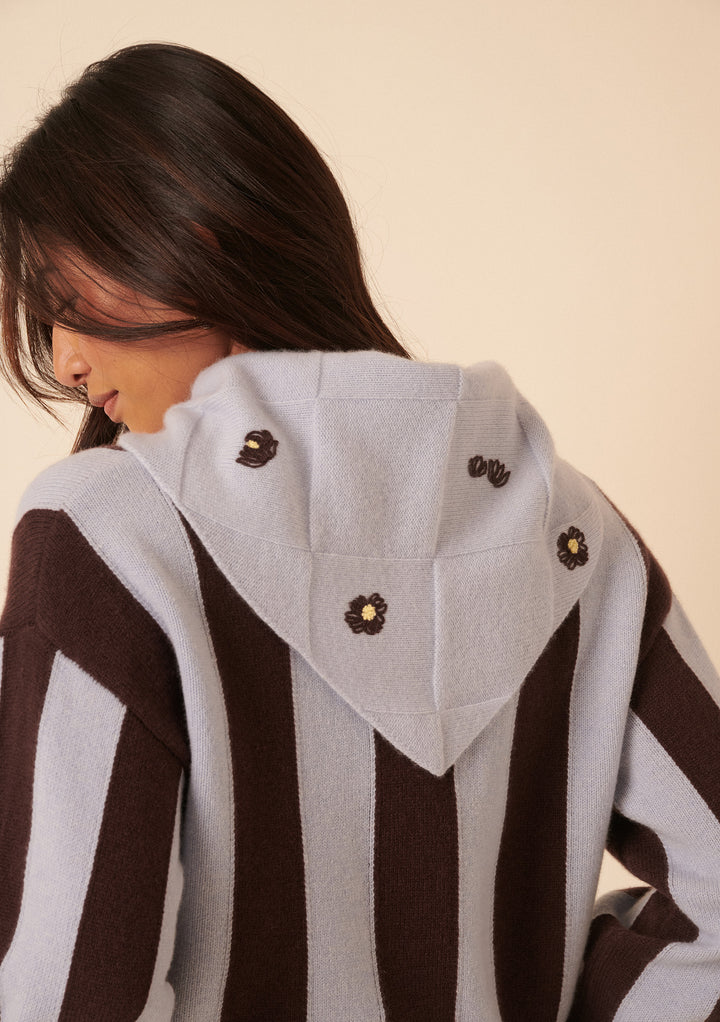 Model wearing TBCo striped wool jumper with NC x TBCo Blue Floral Wool Triangle Scarf draped over shoulders showing floral embroidery