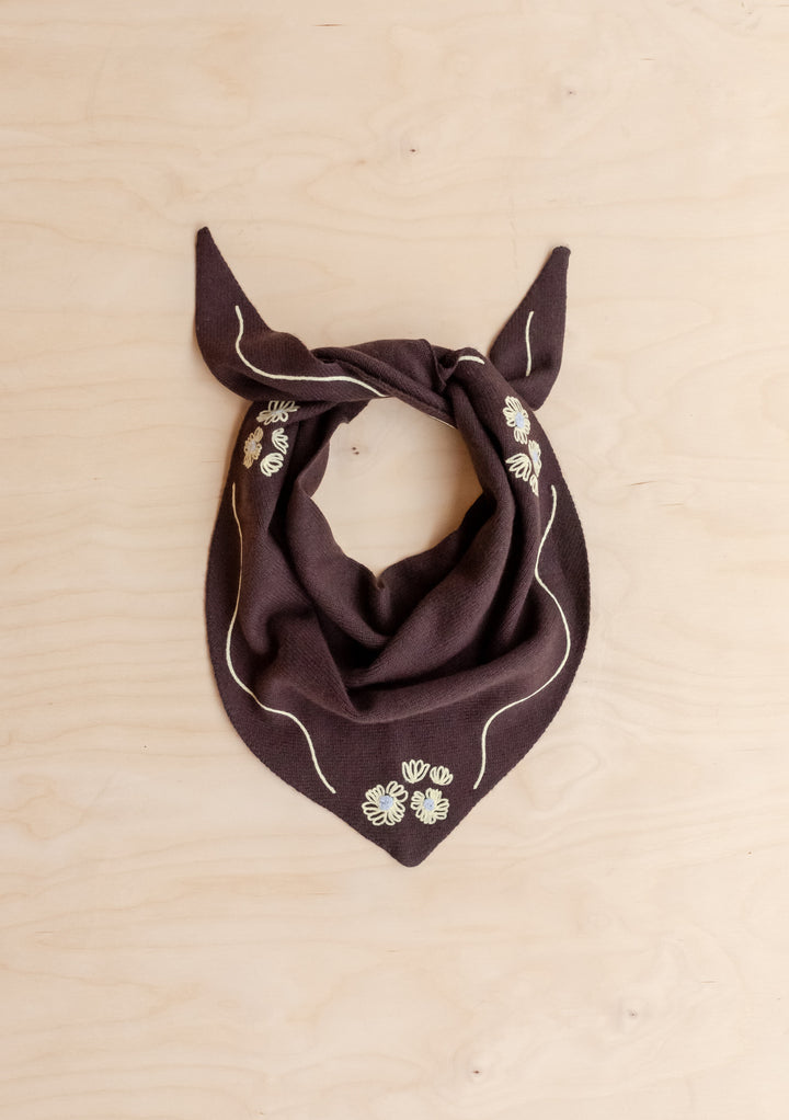NC x TBCo Latte Floral Wool Triangle Scarf in brown merino wool with delicate yellow floral embroidery design