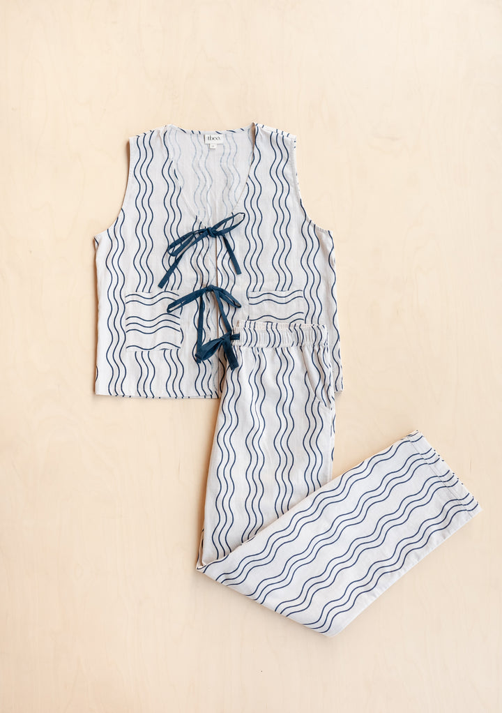 TBCo Cotton Tie Set in Blue Wave pattern, featuring cream and blue two-piece loungewear with wave stripes and adjustable ties