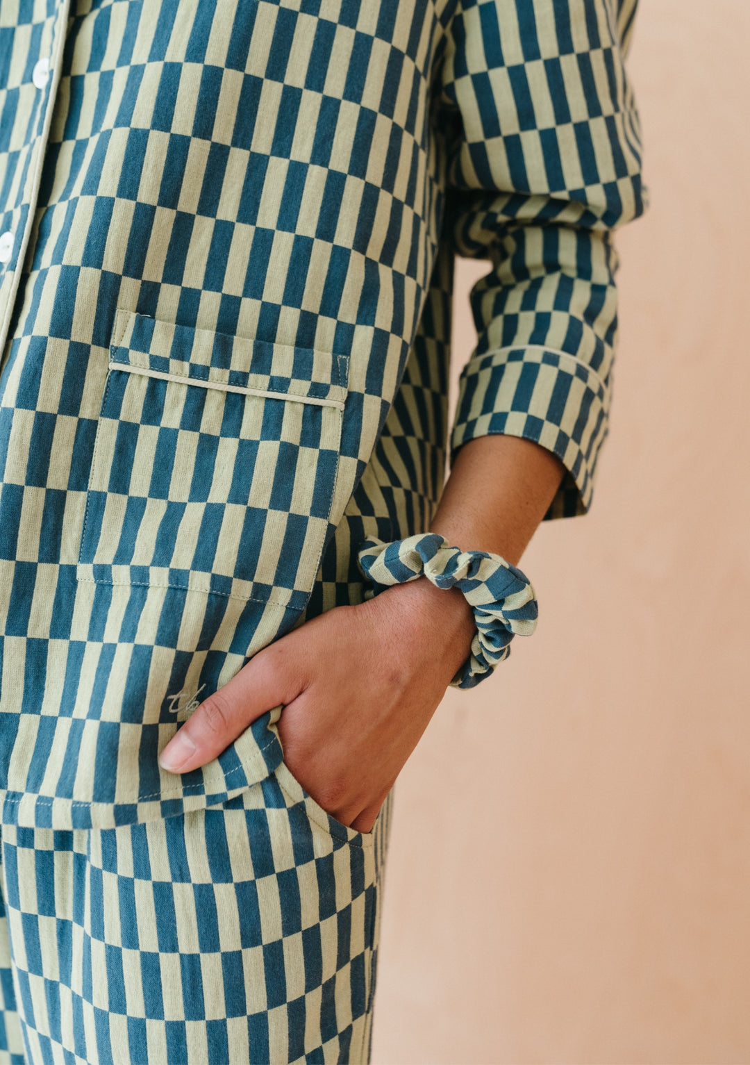 TBCo Cotton Pyjamas in Green Checkerboard pattern with matching scrunchie and pocket detail, showcasing oversized comfort fit