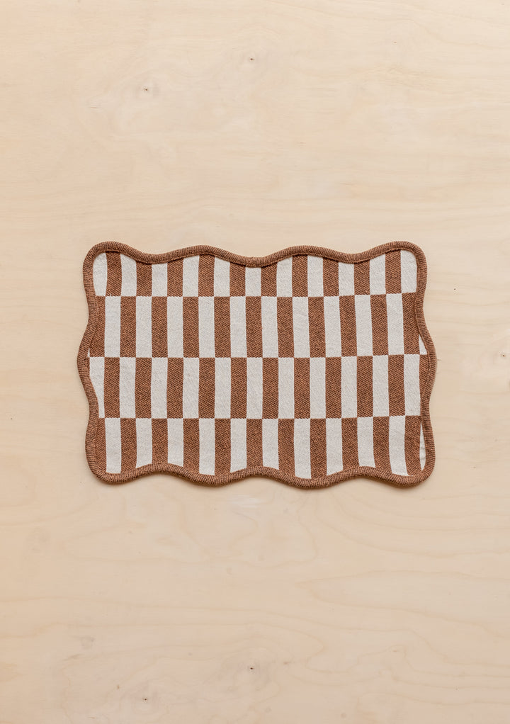 TBCo Cotton Placemat in Camel Checkerboard pattern with scalloped edges and contrast piping, displayed on cream background