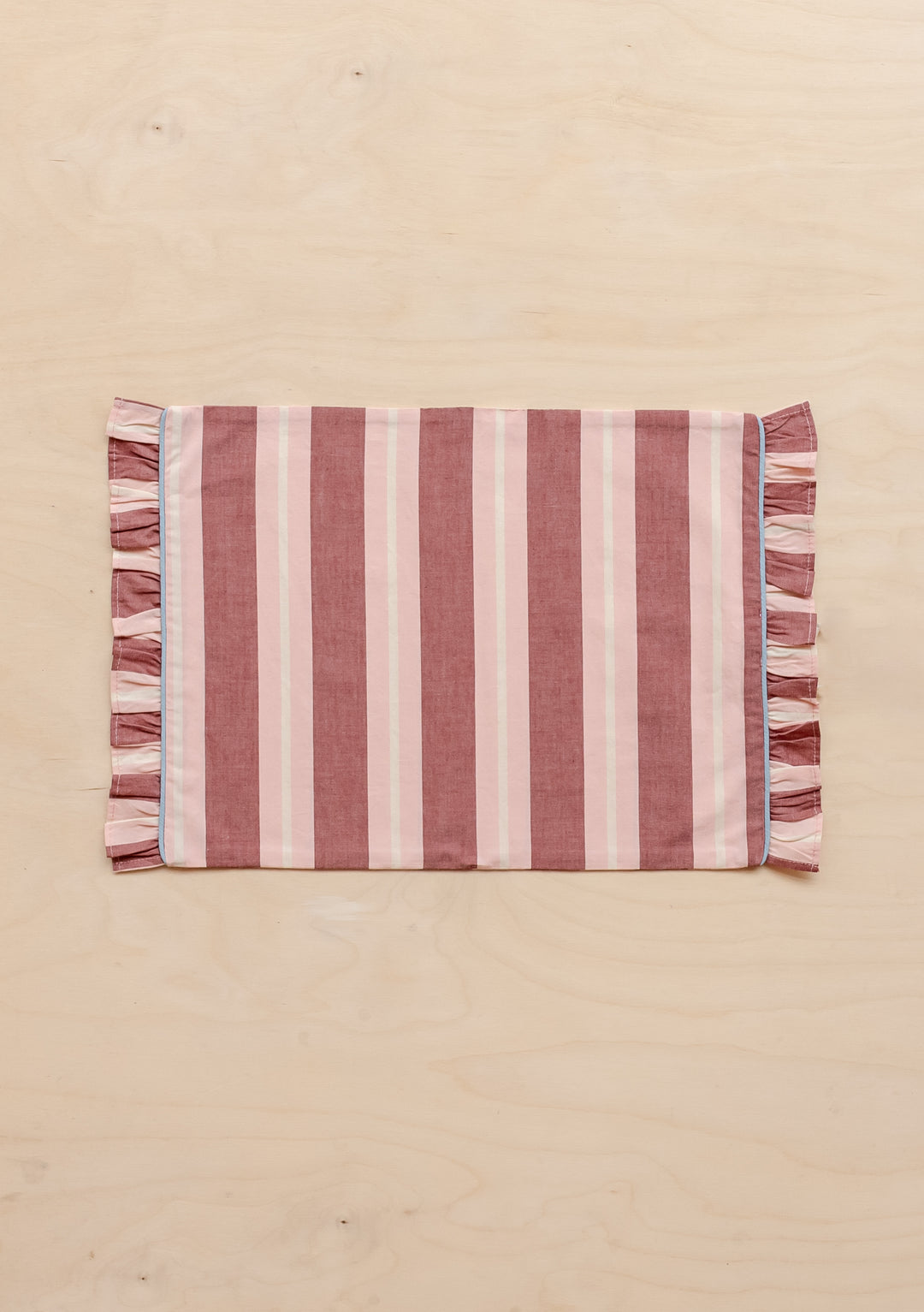 TBCo Cotton Placemat in red and pink stripes with frilled edges, showcasing elegant table decor design by TBCo