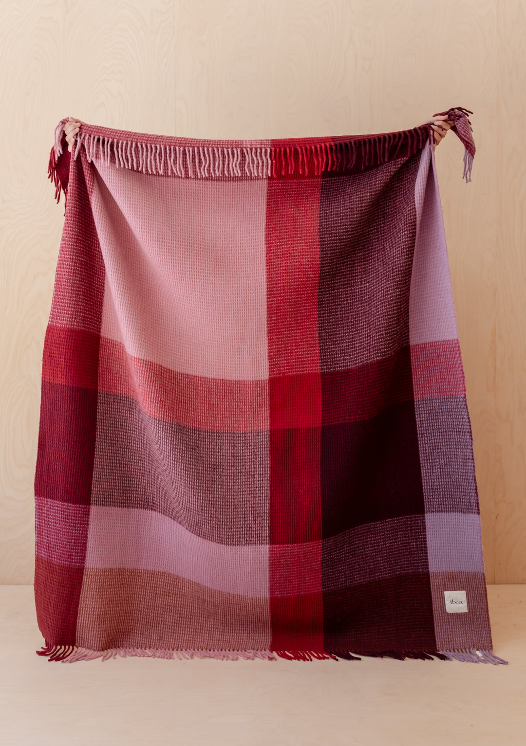 TBCo Recycled Wool Blanket in Burgundy Waffle Block Check with fringed edges and cosy textured weave for warmth and style