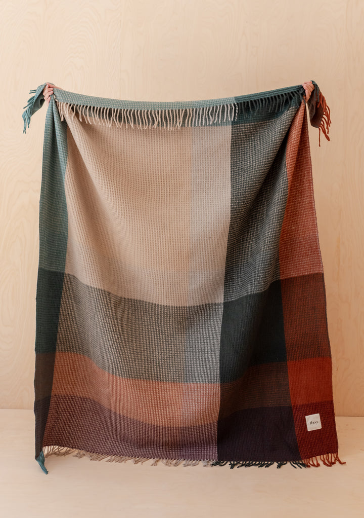 TBCo Recycled Wool Blanket in Green Waffle Block Check with fringed edges and cosy textured woven design