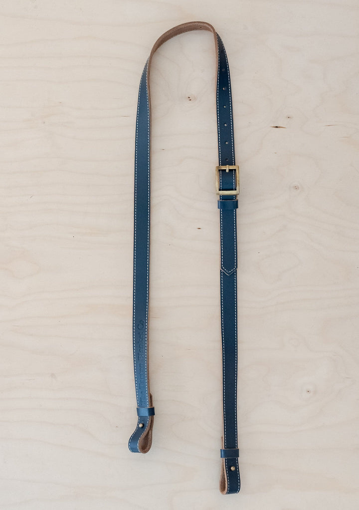 TBCo Leather Long Shoulder Picnic Strap in Navy, crafted from high quality materials for effortless carrying of picnic blankets. Featuring an adjustable design and durable construction, perfect for outdoor adventures.