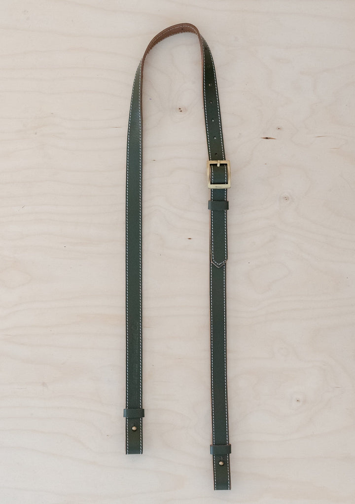 TBCo Leather Long Shoulder Picnic Strap in Olive, crafted from high quality materials for effortless carrying of picnic blankets. Featuring an adjustable design and durable construction, perfect for outdoor adventures.