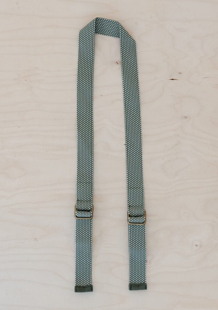 TBCo Recycled Long Shoulder Picnic Strap in Olive, crafted from sustainable materials for effortless carrying of picnic blankets. Featuring an adjustable design and durable construction, perfect for outdoor adventures.