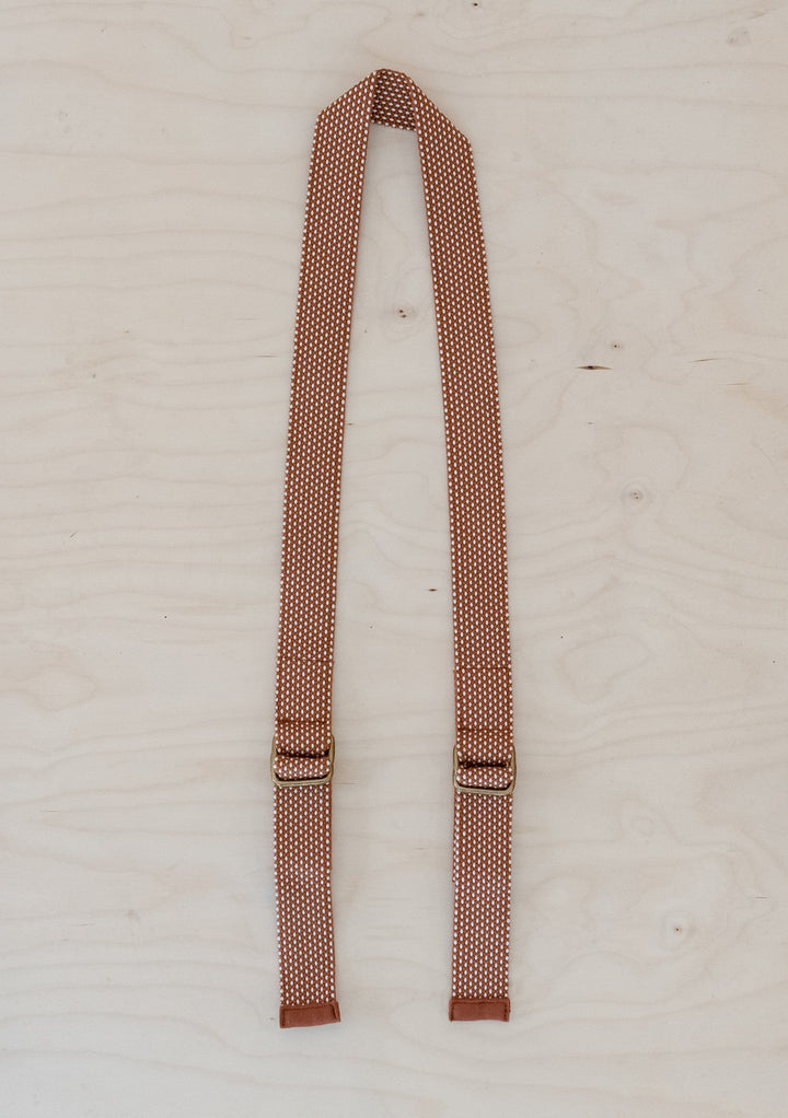 TBCo Recycled Long Shoulder Picnic Strap in Rust, crafted from sustainable materials for effortless carrying of picnic blankets. Featuring an adjustable design and durable construction, perfect for outdoor adventures.