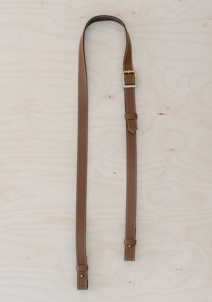 TBCo Leather Long Shoulder Picnic Strap in Tan, crafted from high quality materials for effortless carrying of picnic blankets. Featuring an adjustable design and durable construction, perfect for outdoor adventures.