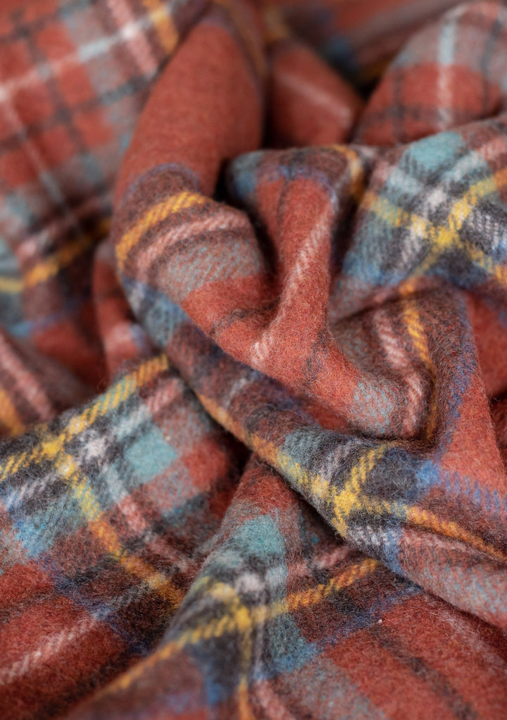 TBCo recycled wool small blanket in Stewart Royal Antique tartan pattern showing rich red and blue plaid textile detail
