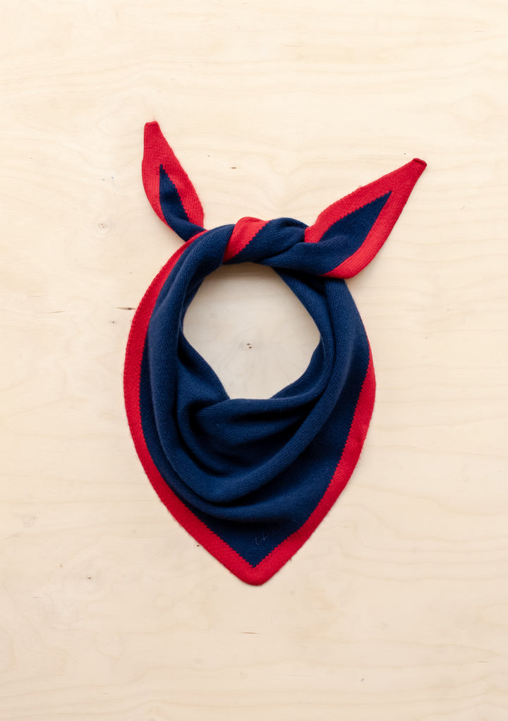 Merino Triangle Scarf in Navy & Red by TBCo, knitted merino wool with contrasting red edge and embroidered logo detail.