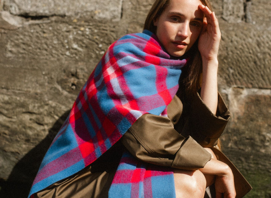 Model wears a TBCo blue and cream gingham lambswool oversized scarf.