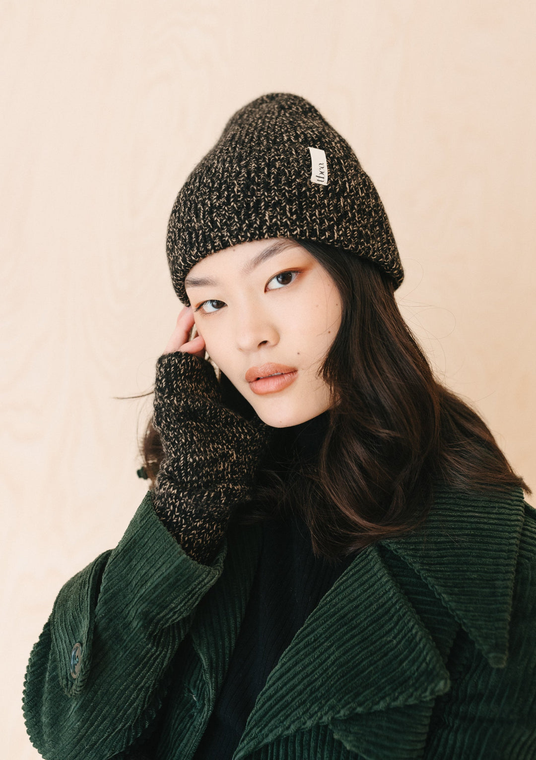 TBCo Cashmere & Merino Beanie in Black Fleck, chunky knit winter hat in speckled black and neutral wool blend, with brand label