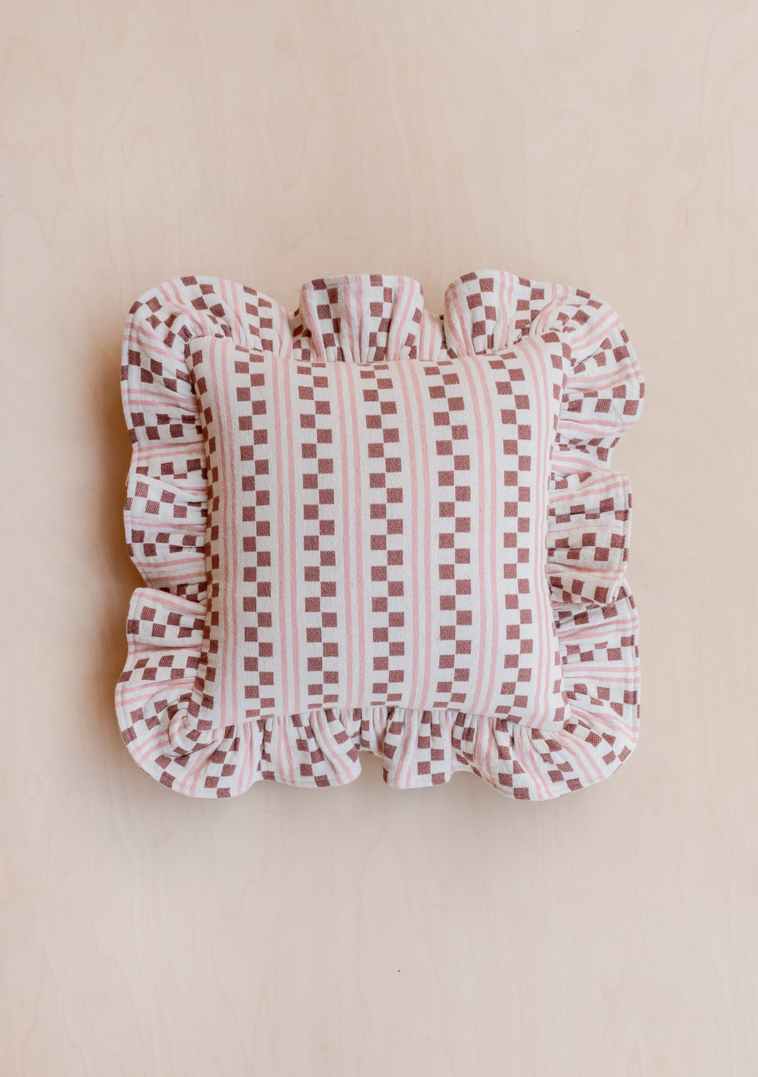 TBCo Cotton Cushion Cover featuring pink and rust checkerboard stripes with ruffled edges on cream background, square shaped