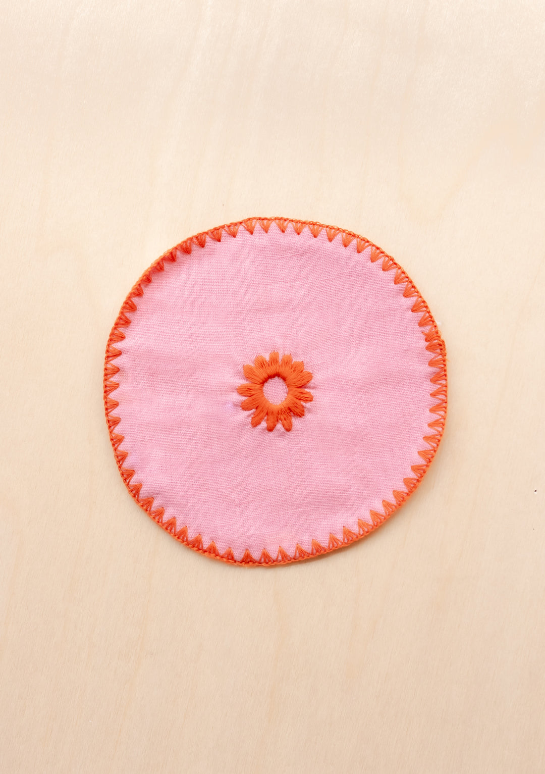 TBCo cotton coasters in pink linen featuring a soft woven texture design . Designed for stylish and practical table protection, these eco-friendly coasters add warmth and sophistication to any home decor.