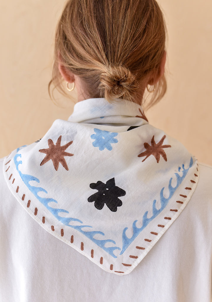TBCo Chiara Perano Artist Series Cotton Square Triangle Neck Scarf and Cotton T-shirt worn by a model from the back showing the print details. 