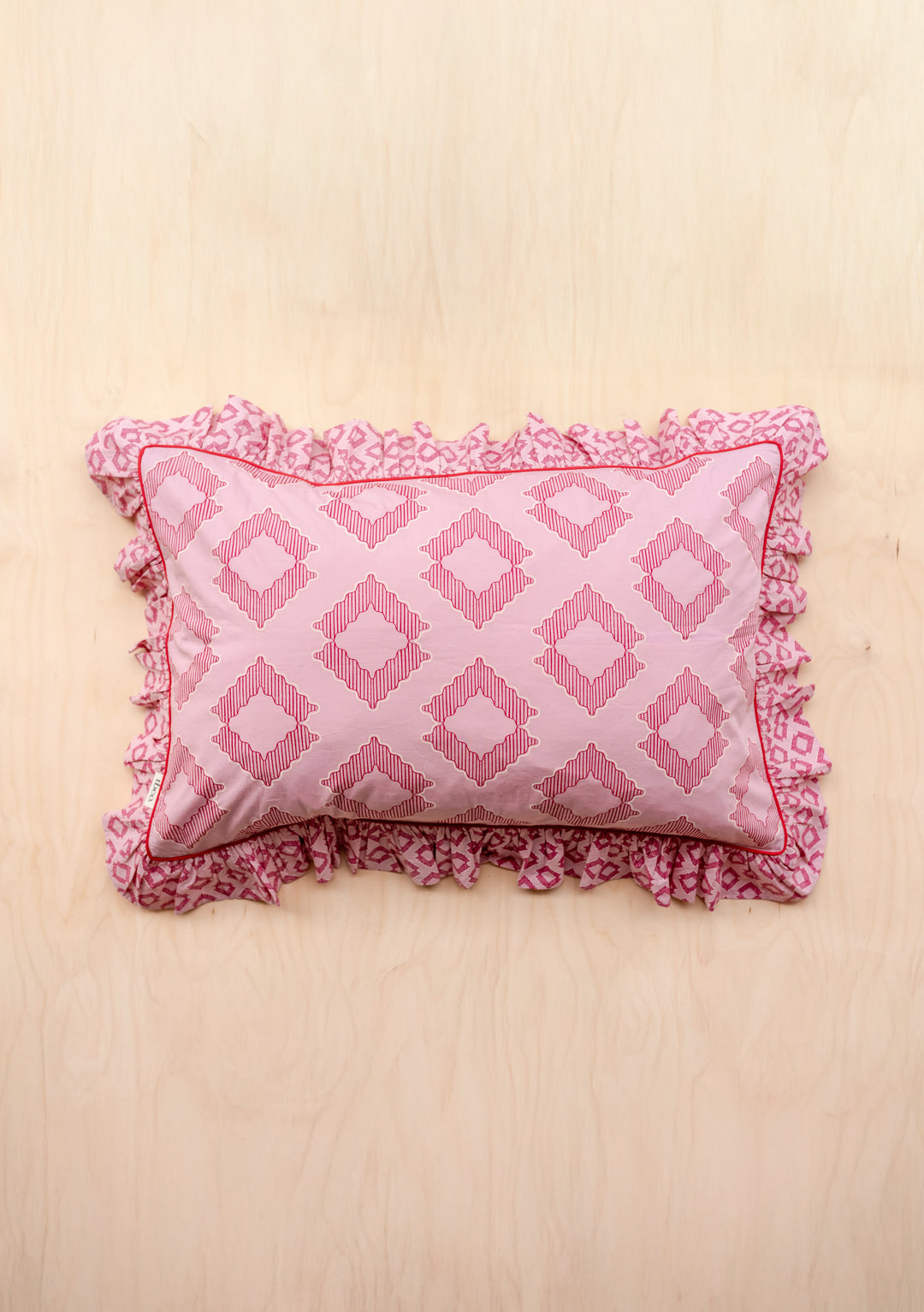 TBCo Cotton Duvet Cover & Pillowcases Set in Pink Diamond, gallery image 3, showing intricate diamond pattern pillow with ruffled edges.