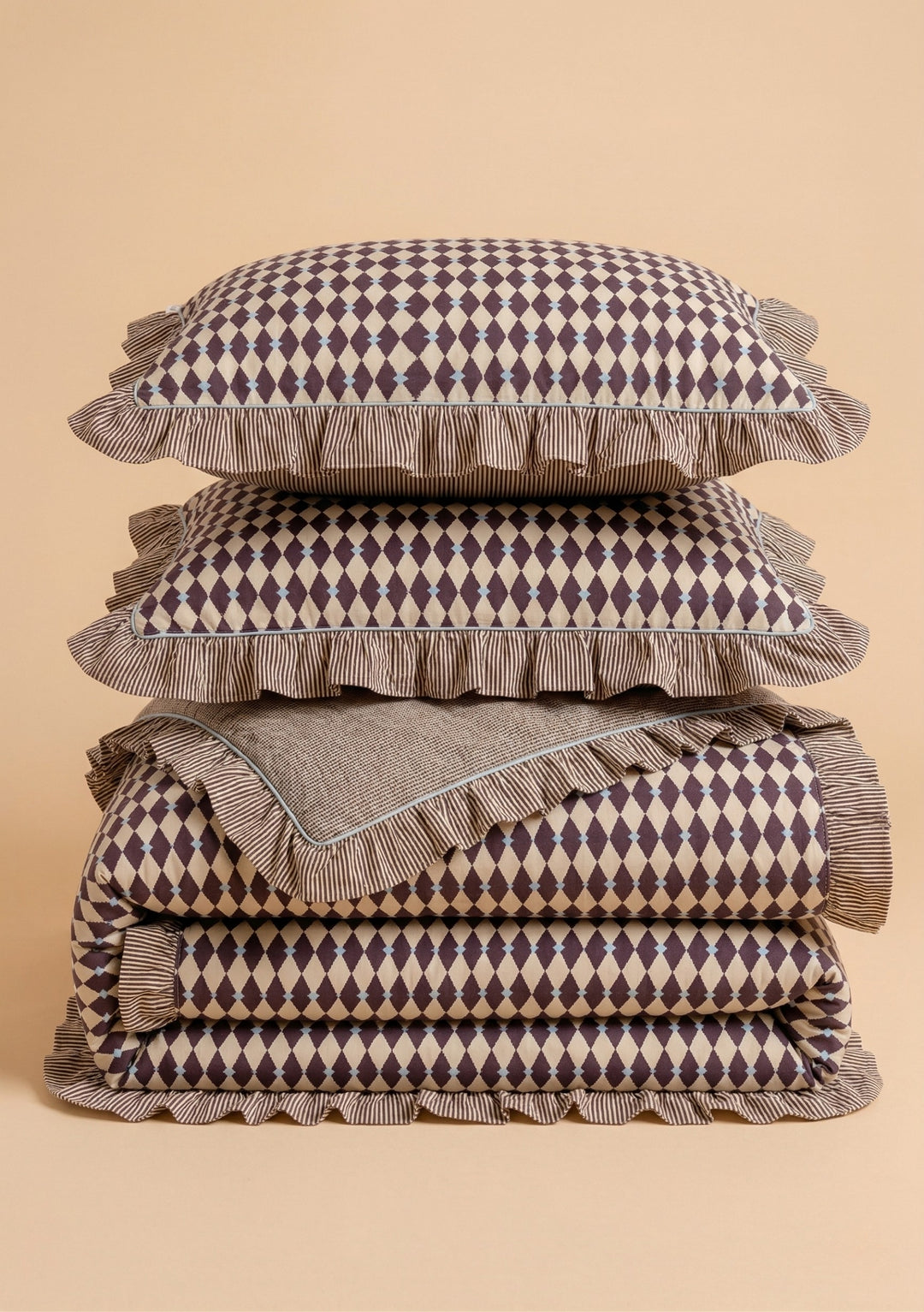 Cotton Duvet Cover & Pillowcases Set in Camel Harlequin by TBCo with diamond print and striped ruffle detailing