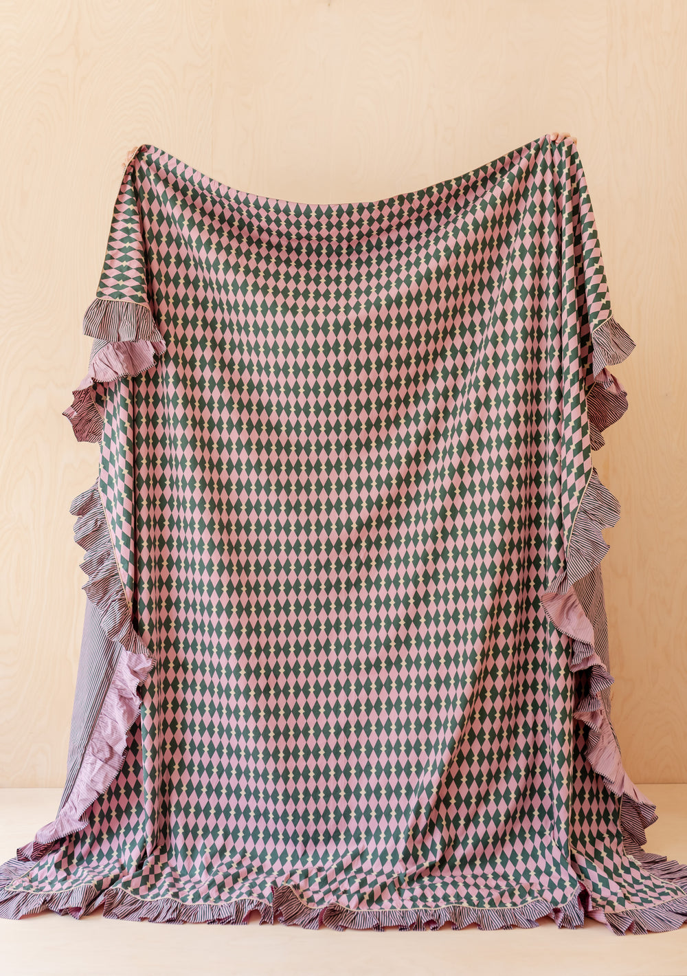 Cotton Duvet Cover in Pink Harlequin by TBCo with ruffled edges and reversible pink, green harlequin and stripe design.