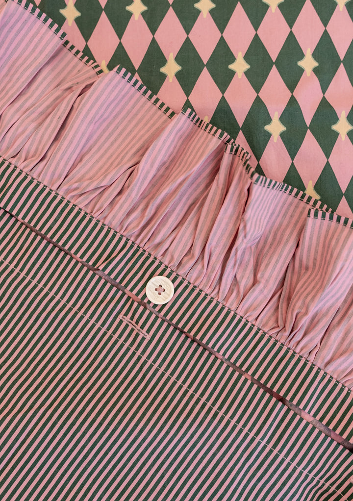 Cotton Duvet Cover in Pink Harlequin by TBCo with ruffled edge, reversible harlequin and stripe patterns, button closure.