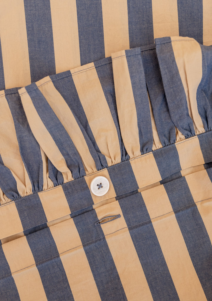 Close-up of TBCo Cotton Duvet Cover in Navy Stripe showing ruffled edge and concealed button closure.