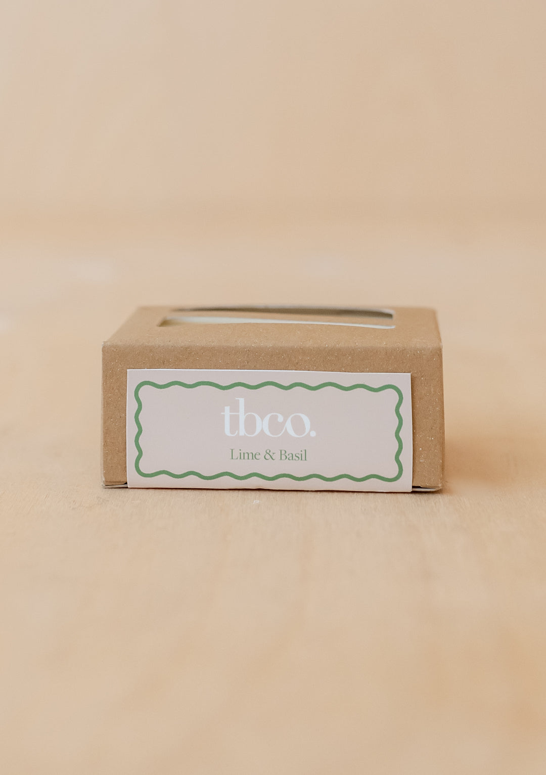 TBCo Lime, Basil & Mandarin soap in kraft box with minimalist label featuring green wavy border and company branding