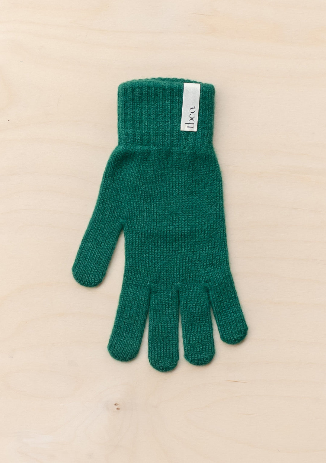 TBCo Cashmere & Merino Gloves in Forest green, knitted luxury winter glove with ribbed cuff detail and brand label