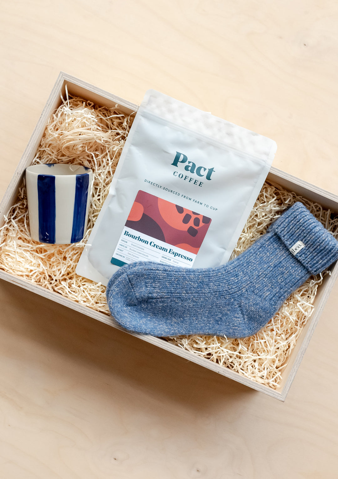 TBCo Ready-Made Coffee Break Gift Box featuring Pact coffee, navy striped mug and blue cashmere socks in presentation box