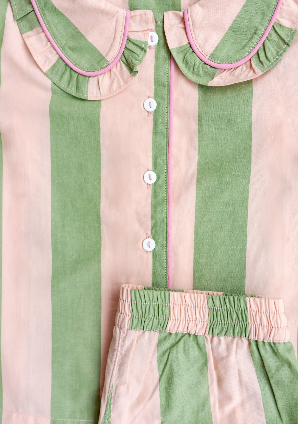 TBCo Cotton Kids Pyjamas in pink and green stripe with ruffled peter pan collar and button-down front