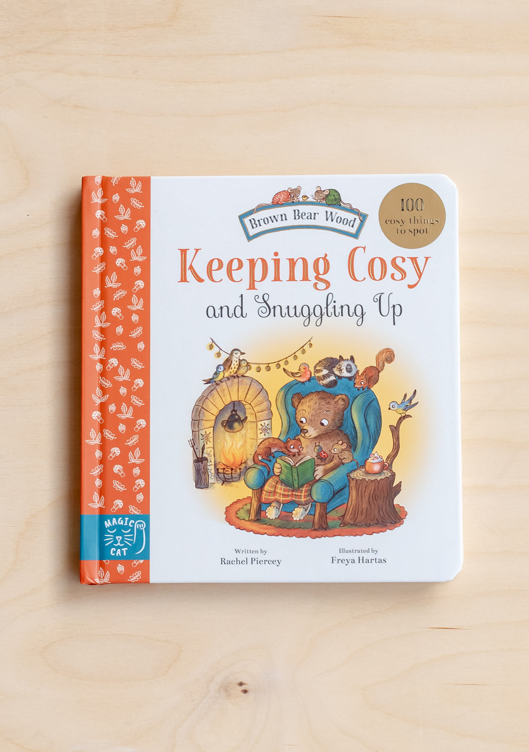 Keeping Cosy & Snuggling Up Book by TBCo featuring Brown Bear Wood’s charming animals in a cosy scene
