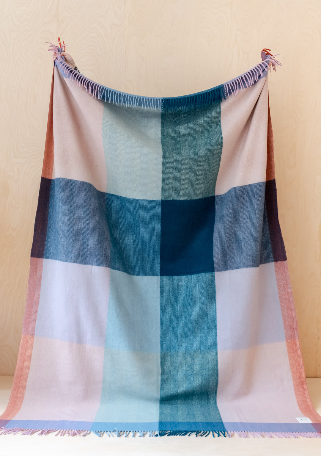 TBCo Recycled Wool Extra Large Blanket in Apricot Frame Check with teal and pink blocks, featuring fringed edges and plaid pattern