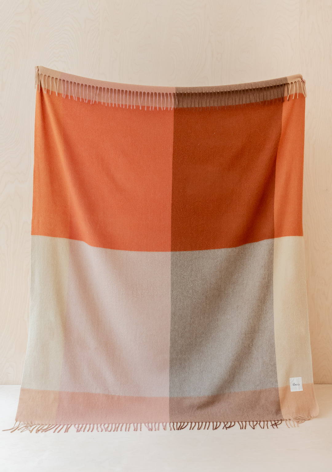 TBCo Lambswool Blanket in Rust Frame Check featuring fringed edges and colour block pattern in rust, sage and cream tones