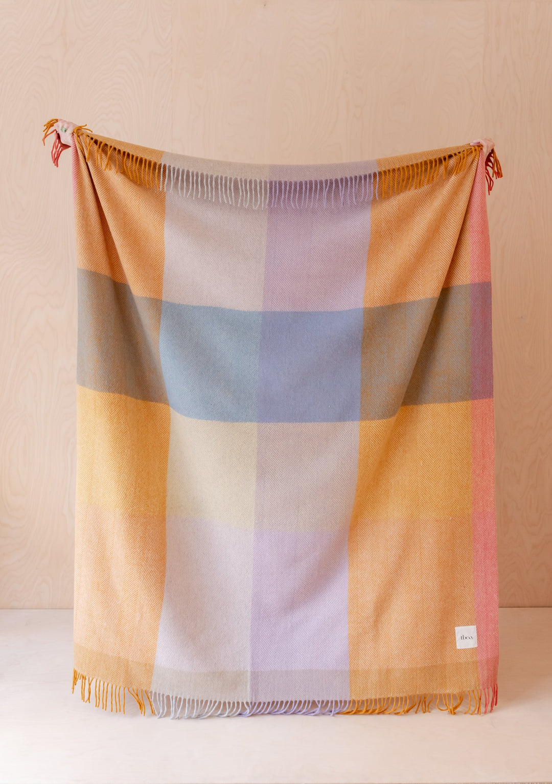 TBCo Recycled Wool Blanket in Mustard Frame Check displayed with fringed edges, featuring blocks of mustard yellow, lilac and blue