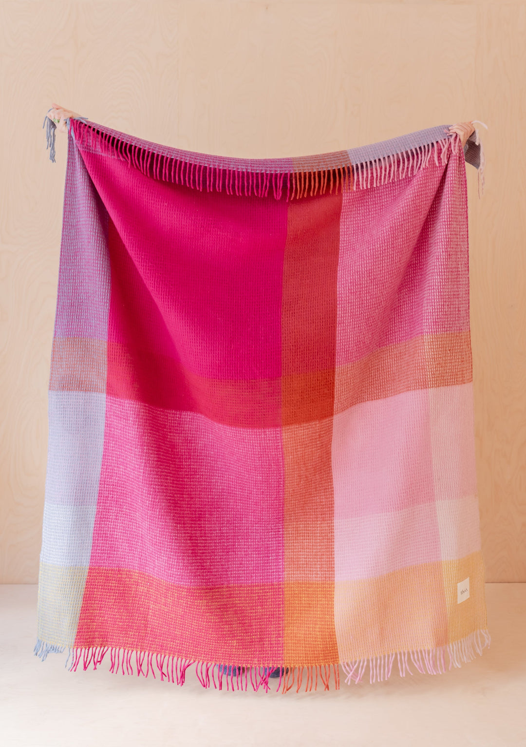 TBCo Recycled Wool Blanket in Pink Waffle Block featuring colourful checkered pattern with fringed edges and textured weave