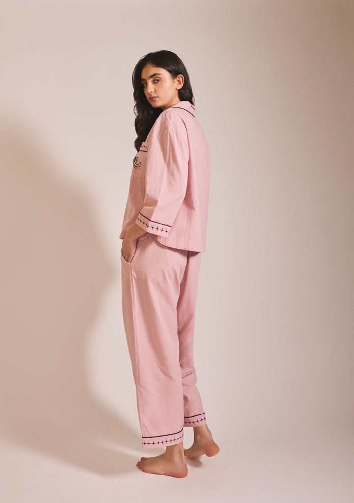 Model wearing TBCo Cropped Cotton & Linen Pyjamas in Pink with blackberry embroidery side view portrait gallery 4